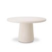 Round concrete dining table in cream for outdoor spaces