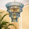 Elegant blue glass chandelier with curved panels