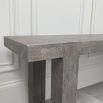 Stylish and natural finish console table with bold, square legs