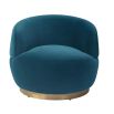 Small and circular blue swivel chair with rounded edges and brass base