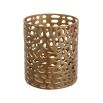 Alluring small candle holder with brushed brass finish and organic shape hole design