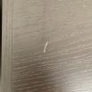 Scuff on the surface of one of the tables