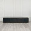 Strikingly stylish dark grey TV cabinet with brass accents and four doors