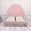 Gorgeous, statement kingsize bed with rounded, fluted headboard and blossom-coloured upholstery