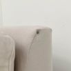 romantic luxury designer sofa in neutral velvety upholstery with minor marks and scuff
