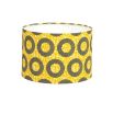 A vibrant yellow African-inspired lampshade by Eva Sonaike
