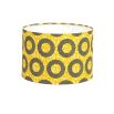 A vibrant yellow African-inspired lampshade by Eva Sonaike