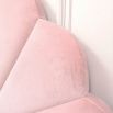 Gorgeous, statement kingsize bed with rounded, fluted headboard and blossom coloured upholstery