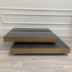 Lovely black and brass coffee tables with overlapping layers
