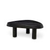 Black wooden coffee table with pebble-shaped top and three legs