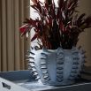 Light blue and white planter with spike design