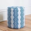 Elegant indigo patterned pouffe with quilted seat 