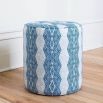Elegant indigo patterned pouffe with quilted seat 