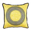 A vibrant cushion by Eva Sonaike with a yellow African-inspired pattern and fringing