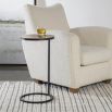 Metal side table with circular brass top