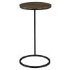 Metal side table with circular brass top