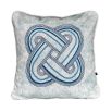 A luxury cushion by Eva Sonaike with a blue African-inspired pattern
