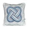 A luxury cushion by Eva Sonaike with a blue African-inspired pattern