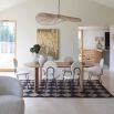 solid light oak dining table in rectangular shape with elegant curved edges