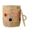Wicker basked with multi-coloured dot design