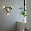 Elegant black gunmetal triangular structure with four orb shades