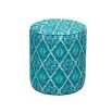 A luxury pouffe by Eva Sonaike with a turquoise African-inspired pattern