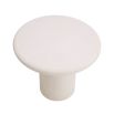 Organic rounded side table in white concrete finish