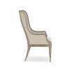 Neutral upholstered dining chair with wooden frame