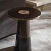 Sleek side table finished in bronze and brass with glass top