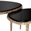 Decadent black top coffee tables with textured brass base