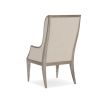 Neutral upholstered dining chair with wooden frame