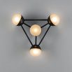 Elegant black gunmetal triangular structure with four orb shades