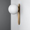 wall sconce with beautiful brushed brass finish and an elegantly detailed frosted glass bulb