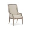 Neutral upholstered dining chair with wooden frame