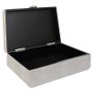 A stylish shagreen box with a white finish and black enamel closure