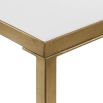 Sleek gold console table with mirror glass top