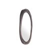 An organically shaped mirror by Eichholtz with a textured bronze highlight finish