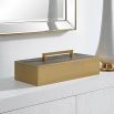 A glamorous brass box by Uttermost with a grey faux shagreen finish 
