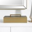 A glamorous brass box by Uttermost with a grey faux shagreen finish 