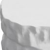 Textured tree trunk-like side table with chalky white finish