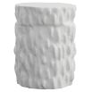 Textured tree trunk-like side table with chalky white finish