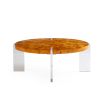 Brown circular coffee table with acrylic legs