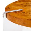 Brown circular coffee table with acrylic legs