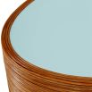 Brown oval reed coffee table with blue glass top