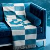Cozy graphic print throw in blue and white with fringe detail