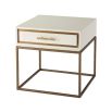 A stylish side table with a white high gloss varnish, a bamboo handle and finished with gold details