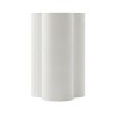 A contemporary side table with a trefoil design and white chalk finish 