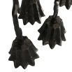 Set of five dynamic silhouette candle holders in black