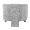 Curved grey armchair in boucle grey finish