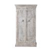 Ornately carved cabinet with washed wood finish